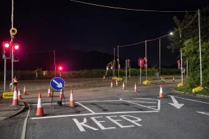 Night traffic signal setup at A4119 Talbot Green Phase 2 works